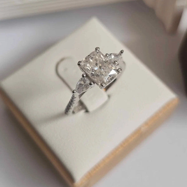 Diamond ring on a jewelry box with a blurred background