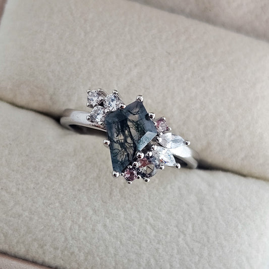 Moss Agate and Alexandrite ring in 925 sterling silver, featuring a kite-cut moss agate centre stone with natural green inclusions, accented by sparkling alexandrite and cubic zirconia stones on a polished silver band.