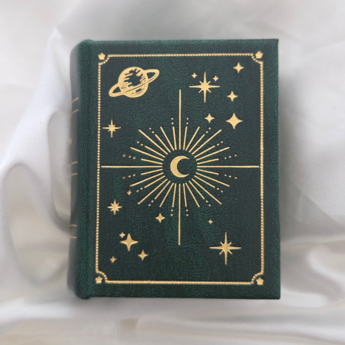 Green and gold celestial book-style ring box