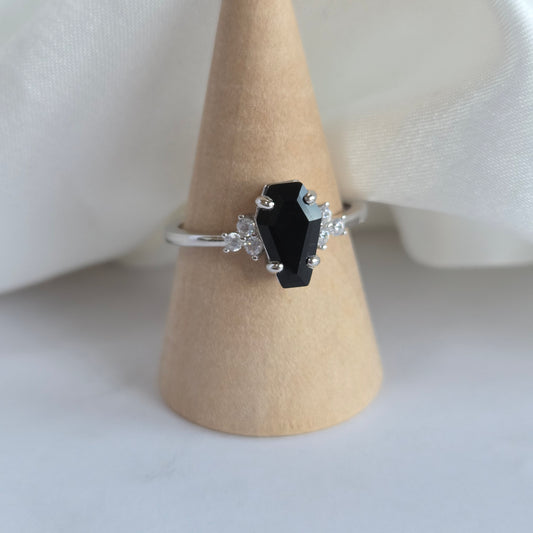 Silver ring with black onyx coffin shaped stone