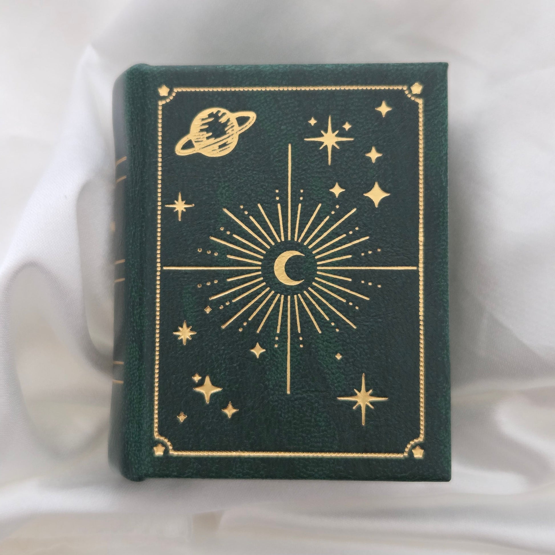 Green and gold celestial book-style ring box