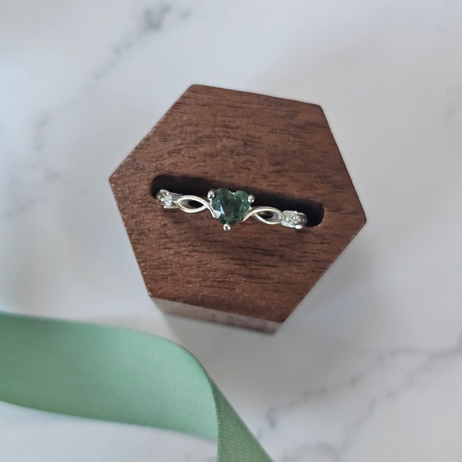 silver ring with heart-cut moss agate stone