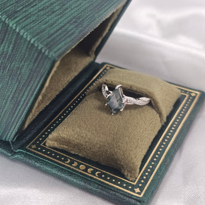 Silver ring with a natural moss agate gemstone in a green jewellery box